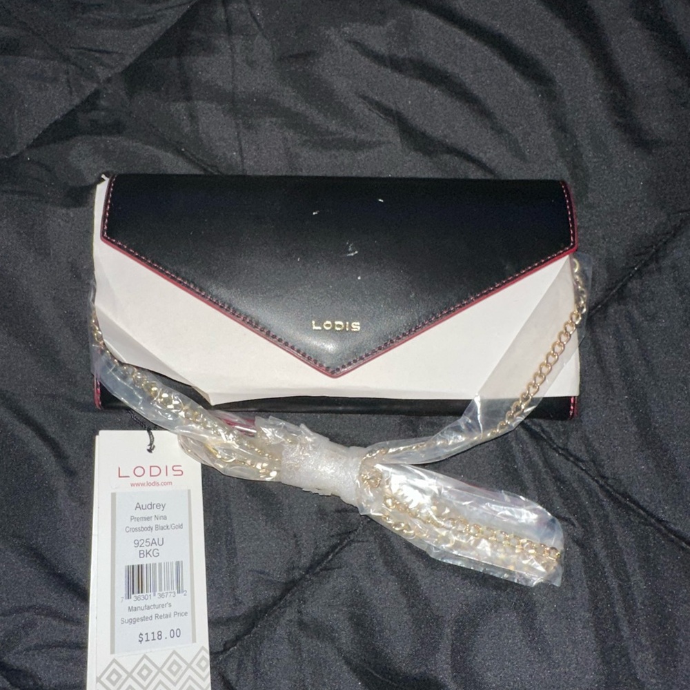 Lodis Black and White Wristlet Clutch Versatile Design